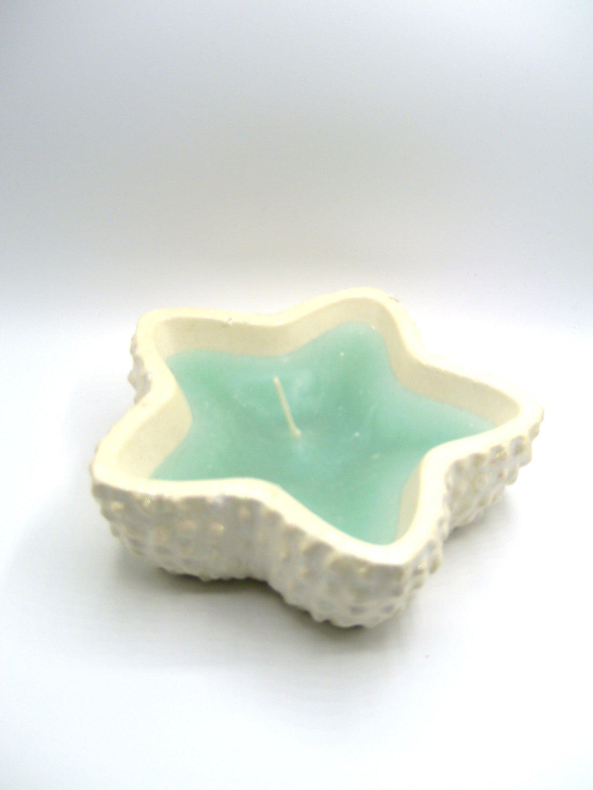 Sternschale Creme mit Mintkerze schräg