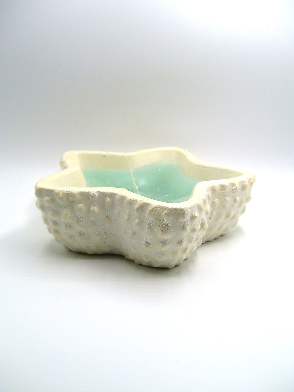 Sternschale Creme mit Mintkerze von der Seite