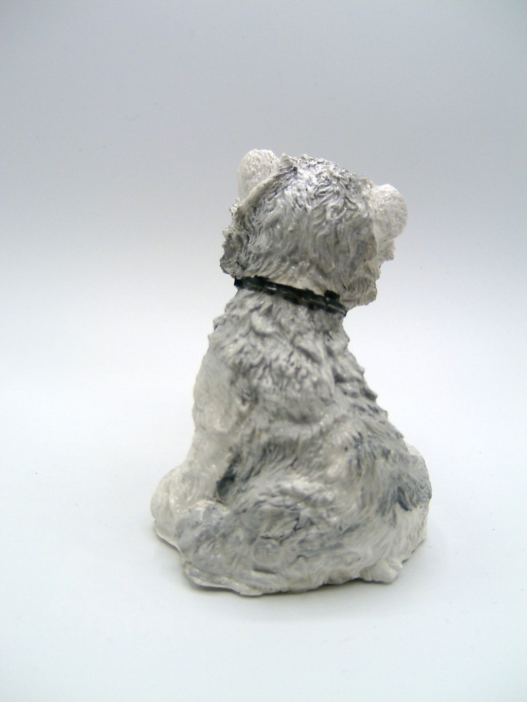 West Highland Terrier Figur von hinten