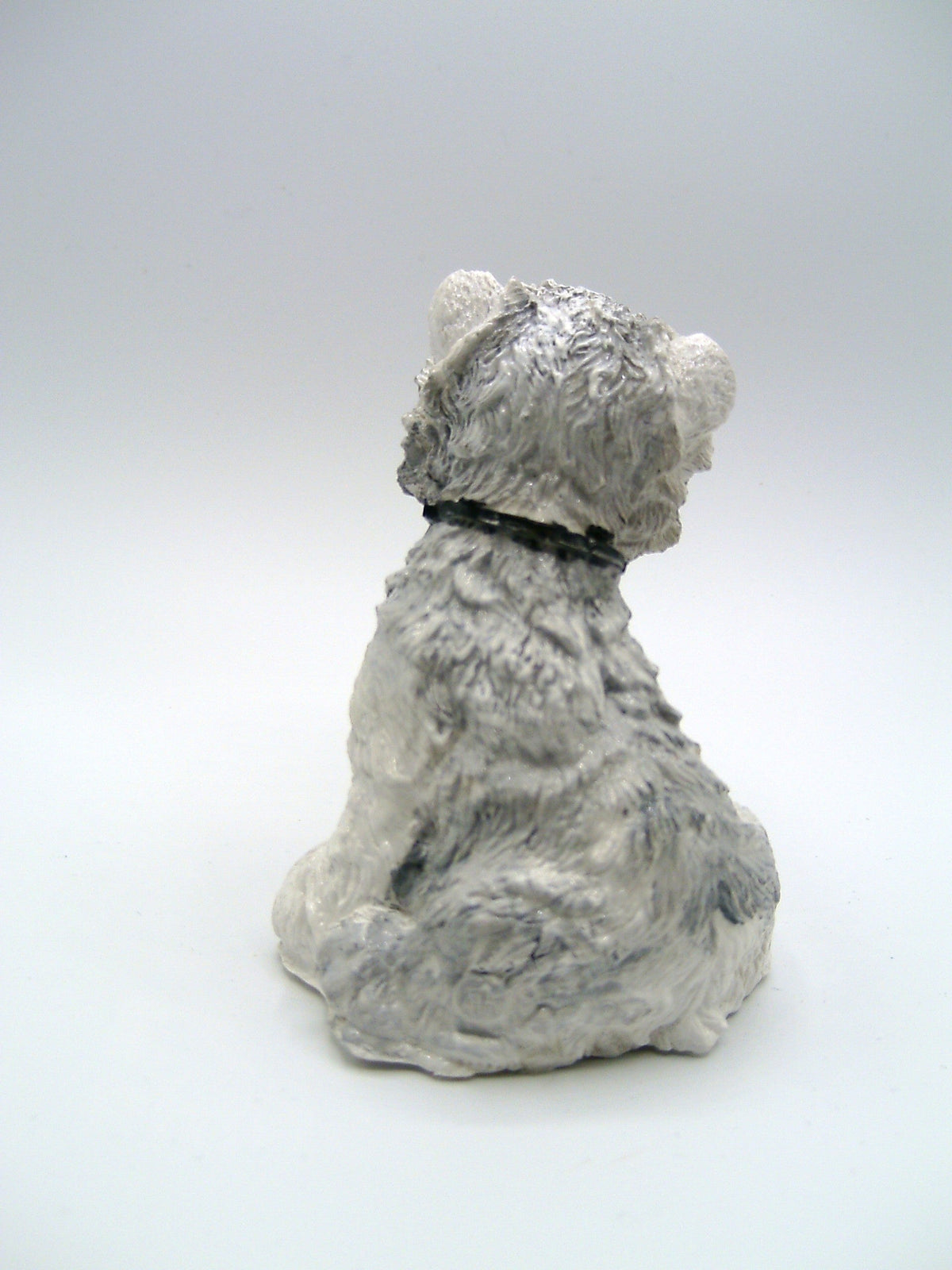 West Highland Terrier Figur von hinten