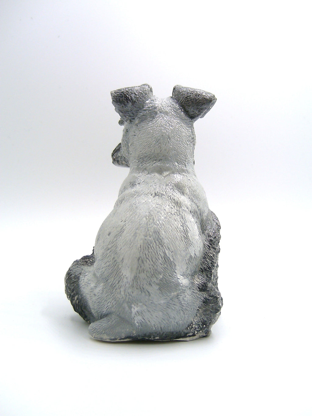 Schnauzer Figur aus Gips von hinten